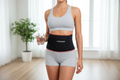 Person wearing red light therapy belt