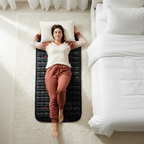 Woman relaxing on wellness mat